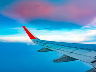 Obraz premium Sky and cloud view and wing of airplane