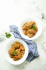 Meatballs with tomato sauce and rice