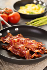 Cooked bacon on a skillet