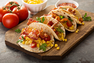Breakfast tacos with scrambled eggs and bacon