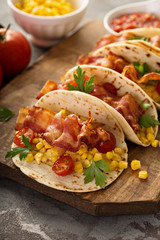Breakfast tacos with scrambled eggs and bacon