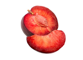 Half plums with slice