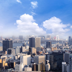 Cityscapes of Tokyo, city aerial skyscraper view of office building and downtown and street of  minato in tokyo with blue sly and clouds background. Japan, Asia