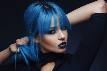 Aluminium Prints Hairdressers Portrait of a young woman with blue color hair