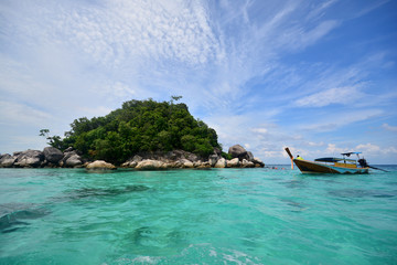 Fototapeta na wymiar Tropical white sand and blue sea with blue sky at Andaman Sea. Lipe Island, Satun, Thailand.