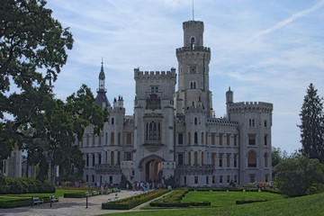 Fototapeta premium HLUBOKA NAD VLTAVOU, CZECH REPUBLIC - AUGUST 24, 2017: Beautiful white renaissance castle Hluboka nad Vltavou, South Bohemia. Summer morning
