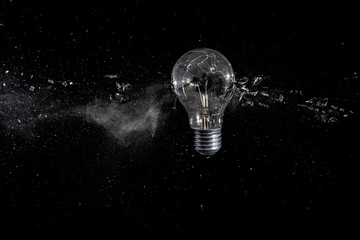  high speed photograph  electric bulb  concept of fragility and creativity.