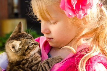 child and cat romance