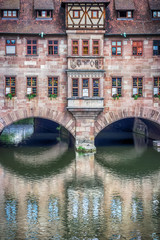 Fototapeta na wymiar Old town architecture and Pegnitz river in Nuremberg, Bavaria, Germany