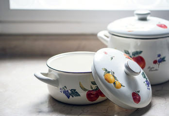 Vintage cooking pot on the kitchen table