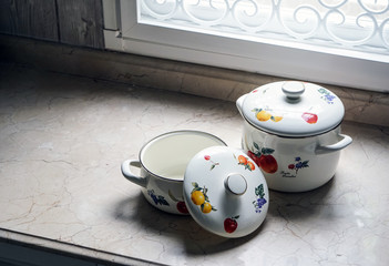 Vintage cooking pot on the kitchen table