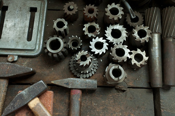 topview on old, vintage metal tools and gear or cogwheels