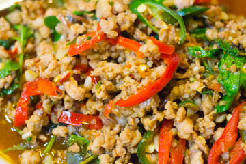 stir-fried with minced pork and basil on white plate (Ka Prao Moo)