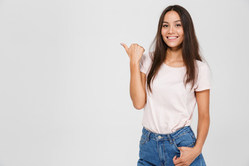 Portrait of a casual young asian woman standing