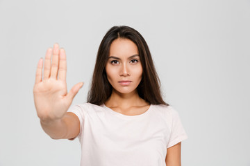 Portrait of a serious young asian woman