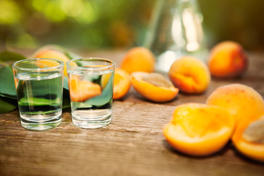 Shot glass with apricot alcohol brandy