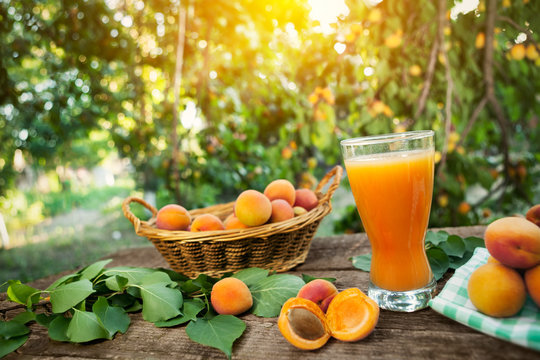 Apricots with apricot juice in glass