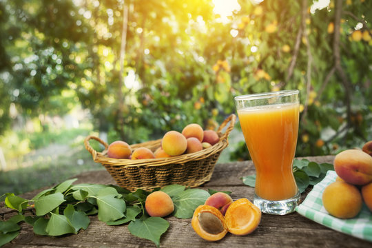 Apricots with apricot juice in glass
