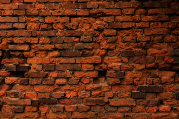 Red old brick wall, destroyed