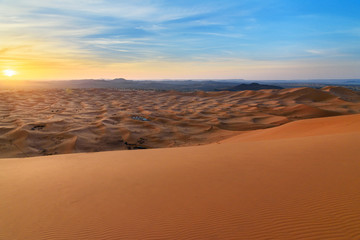Naklejka na ściany i meble Sunrise in Erg Chebbi Sand dunes near Merzouga, Morocco