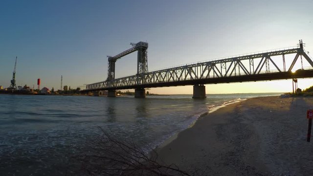A moveable bridge across the mouth of the Dniester in Zatoka (Ukraine). Vertical-lift bridge.