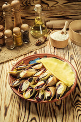 Pancakes with curd and raisins,Food photography. Thin pancakes with fillings,Stuffed pancakes on pottery, selective focus,curd.Pancakes with curd and berries ready for breakfast
