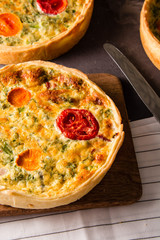 Pieces of quiche lorraine with bacon and cheese. French cuisine.