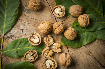 fresh walnuts on an old wooden table