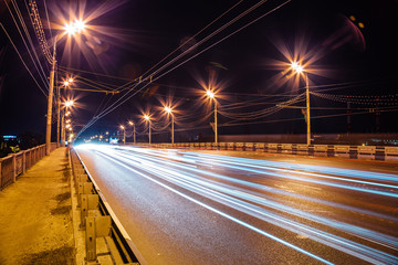 Fototapeta na wymiar Traffic light trails on the bridge at Voronezh
