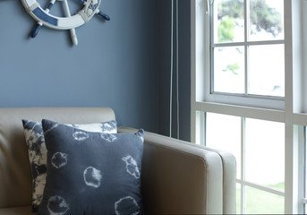 cozy interior decorate blue and white color with sofa and cushions
