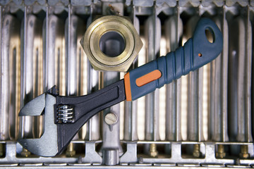 adjust wrench power grip and elements of water and gas shutoff valves, flat lay
