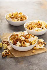 Homemade trail mix with popcorn, pretzels and nuts