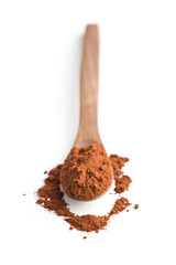Tasty cocoa powder in wooden spoon.