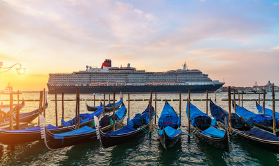 Group of gondolas moored by Saint Mark square