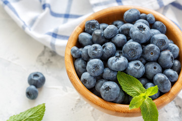 Ripe blueberries in a bowl.