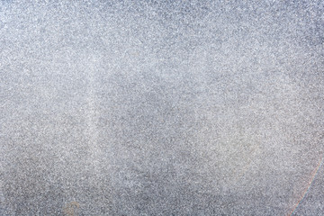 Natural granite stone abstract texture background with vignetting.