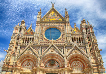 Fototapeta na wymiar Facade of Siena Cathedral (Duomo di Santa Maria Assunta), Siena, Italy