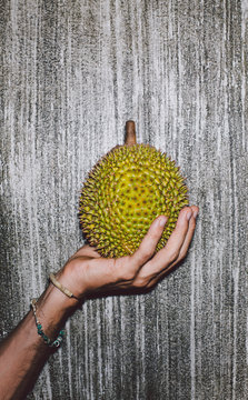 Man holding durian