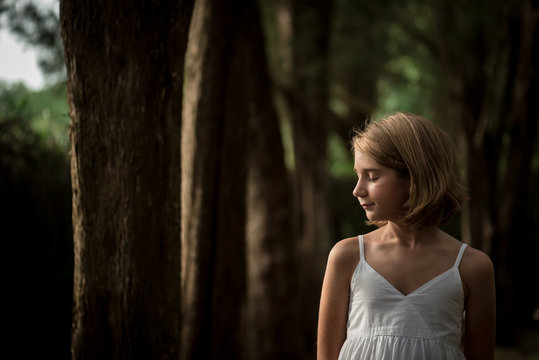 Pre-Teen Girl With Short Hair With Eyes Closed