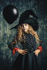 girl in witch costume