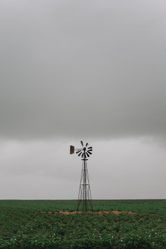 Windmill in a field.
