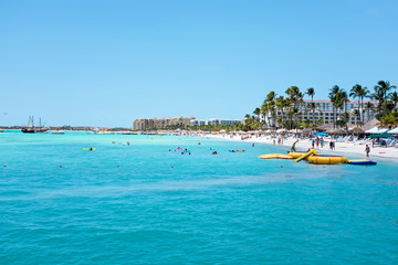 Fototapeta na wymiar Palm Beach on Aruba island in the Caribbean Sea