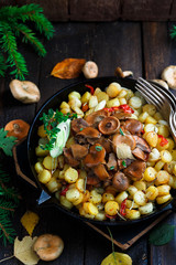 Saffron milk cap mushrooms with fried potatoes, rustic style