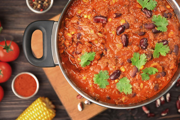 Saucepan with delicious chili con carne, close up