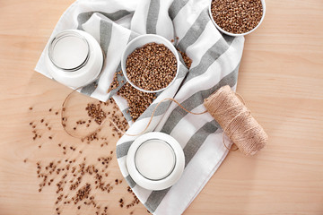 Beautiful composition with hemp milk on table