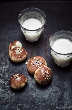 Fresh homemade turkish yeast bread   and yogurt drink on dark baking tray