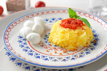 Tasty spaghetti squash on plate, close up
