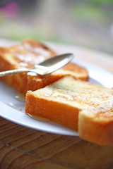 Buttered toast slices with honey