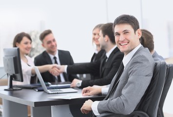 lawyer on the background of business partners handshaking