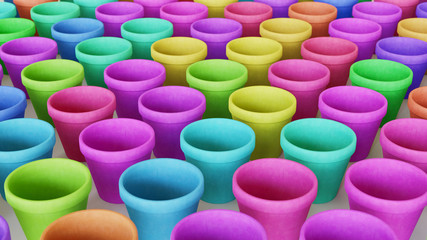 Ordered array of terracotta pots in various vibrant colors